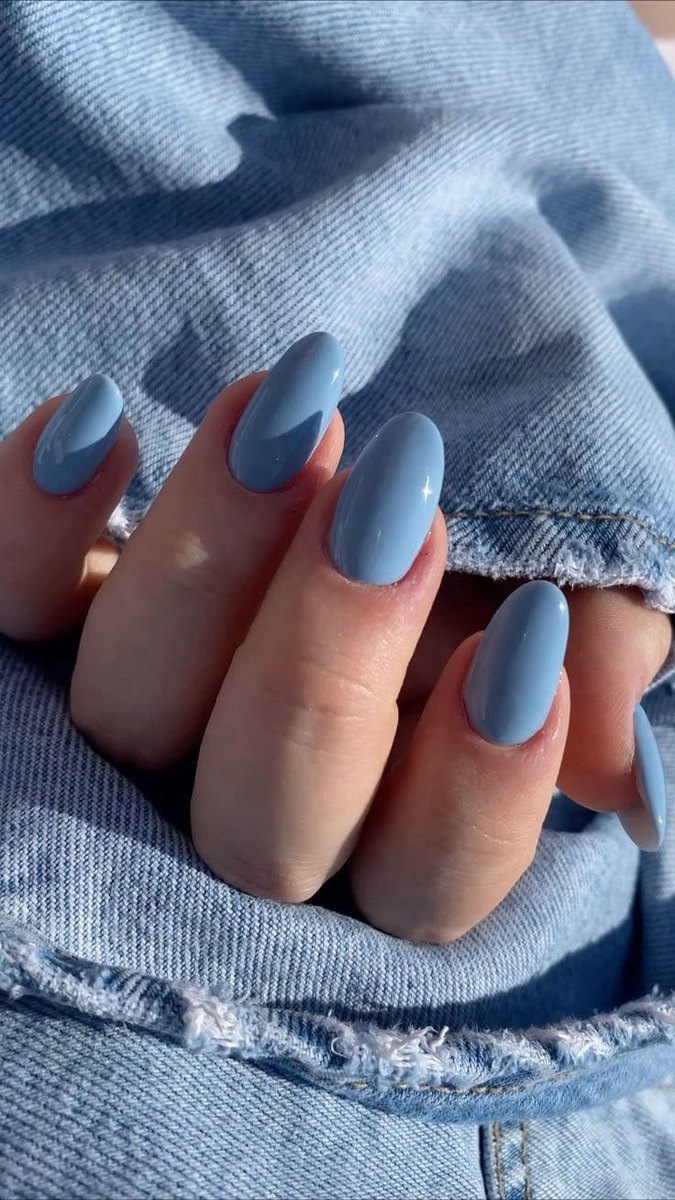 Dusty blue almond nails in a clean single coat